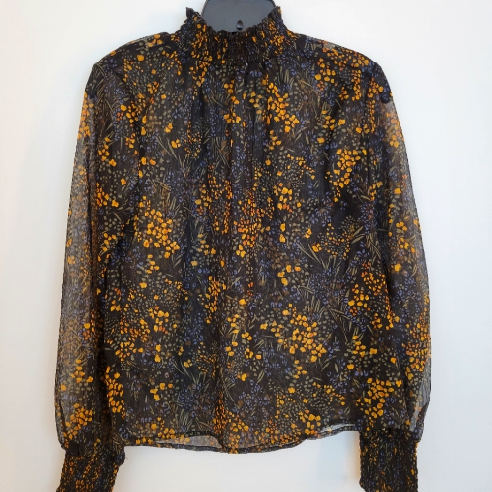 Sheer turtleneck floral blouse